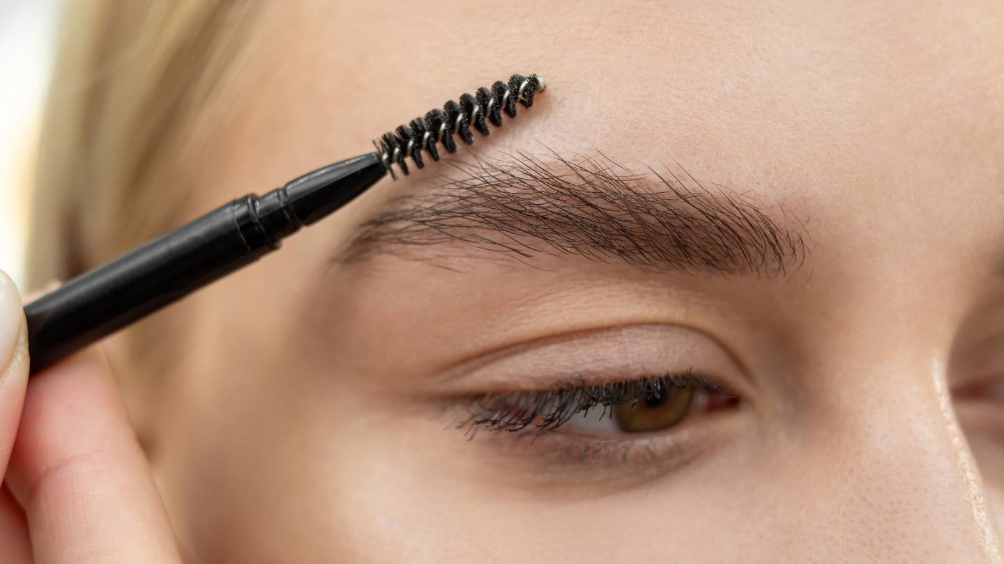 what is the process of eyebrow feathering
